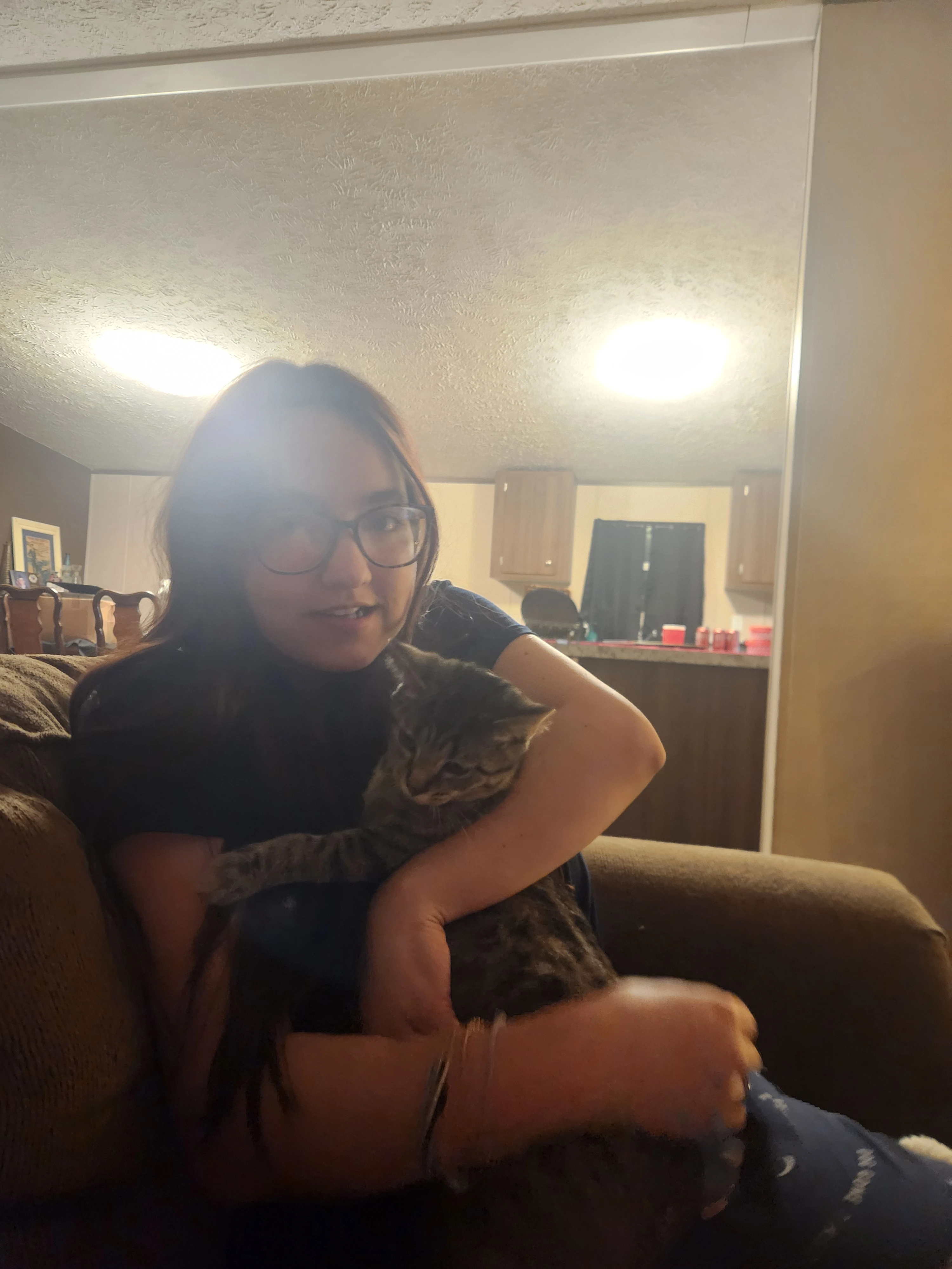 My girlfriend Jasmine in her most precious candid moment: handling cats